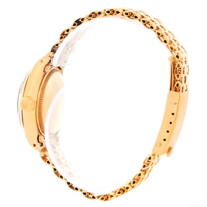 This image shows a side view of the Rolex President 6917 Women's Yellow Gold Blue Dial 6917 Women's Yellow Gold Blue Dial model watch, displaying its case, crown, and bracelet.