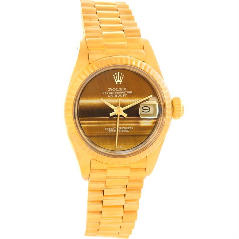 The Rolex President 6917 Women's Yellow Gold Brown Dial 6917 Women's Yellow Gold Brown Dial model watch is shown from a front angle, displaying its face, bracelet, and crown.