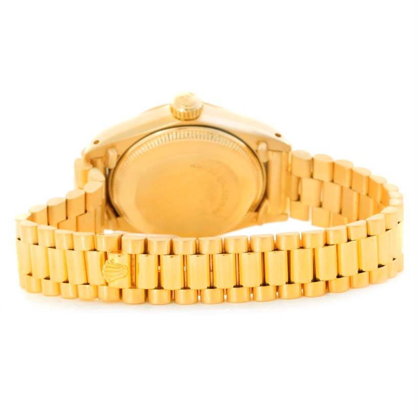 This image shows the back view and bracelet of the Rolex President 6917 Women's Yellow Gold Brown Dial 6917 Women's Yellow Gold Brown Dial model watch.