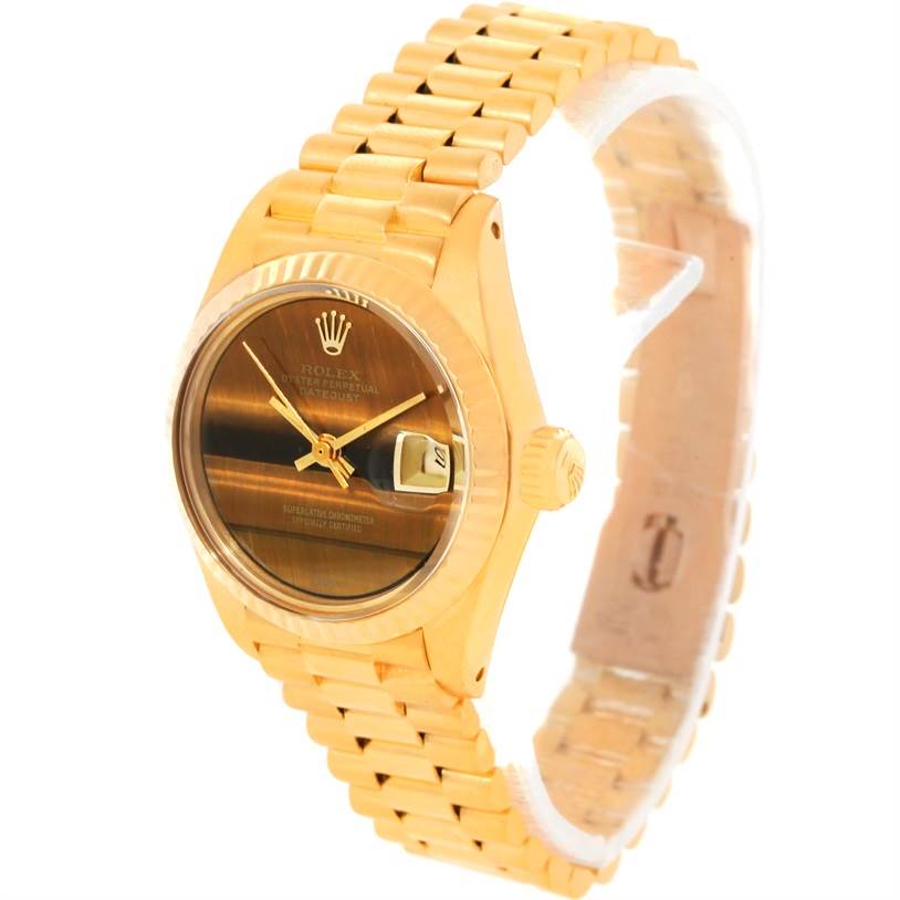 The image shows a Rolex President 6917 Women's Yellow Gold Brown Dial 6917 Women's Yellow Gold Brown Dial model watch angled to display the dial, case, crown, and part of the bracelet.