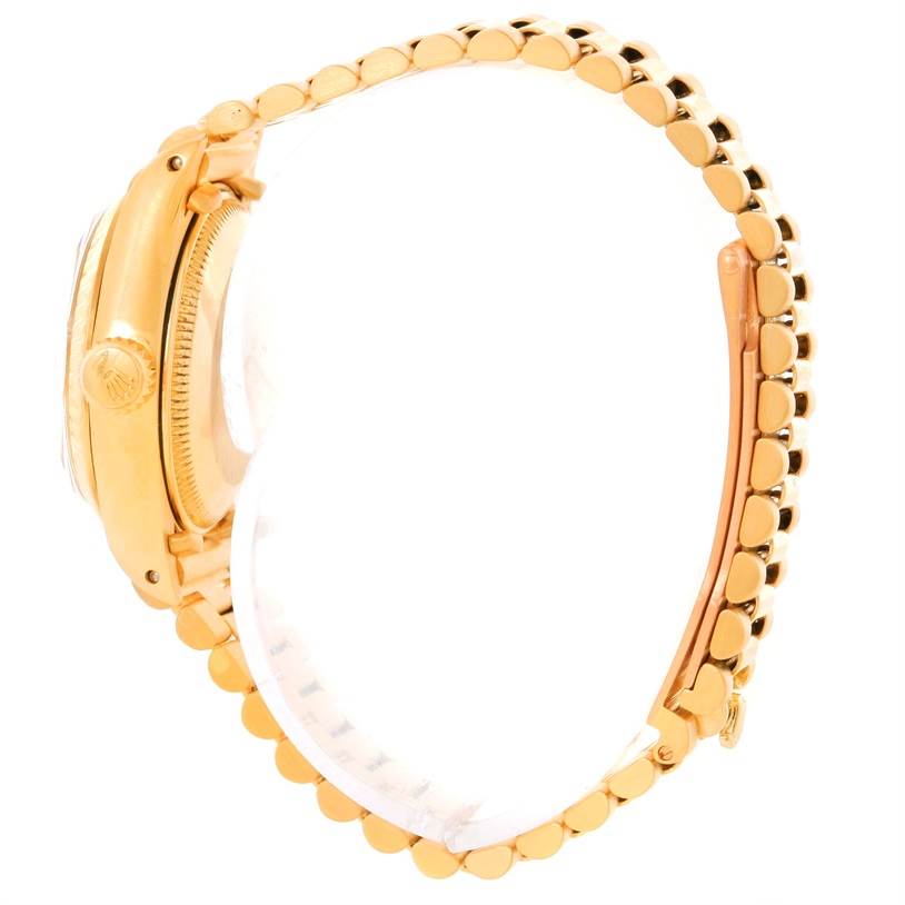 The image shows a side view of a Rolex President 6917 Women's Yellow Gold Brown Dial 6917 Women's Yellow Gold Brown Dial model watch, highlighting the gold case and bracelet.