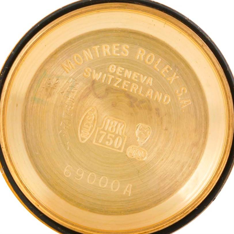 This image shows the inside of a Rolex President 69138 Women's Yellow Gold Champagne Dial 69138 Women's Yellow Gold Champagne Dial model watch case back, displaying markings and engravings identifying the brand and specifications.