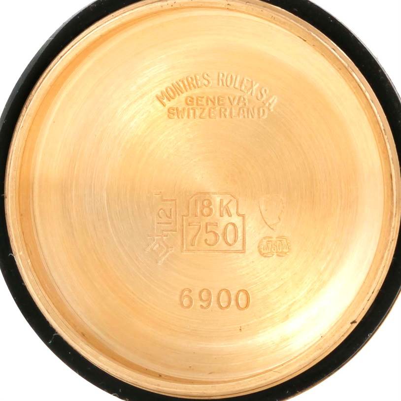 This image shows the inside back case of a Rolex President 6917 Women's Yellow Gold White Dial 6917 Women's Yellow Gold White Dial model watch, engraved with gold content and model numbers.