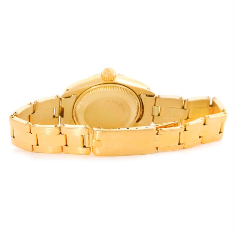 The image shows the back view of a Rolex President 6917 Women's Yellow Gold White Dial 6917 Women's Yellow Gold White Dial model watch, highlighting its case back, crown, and bracelet.