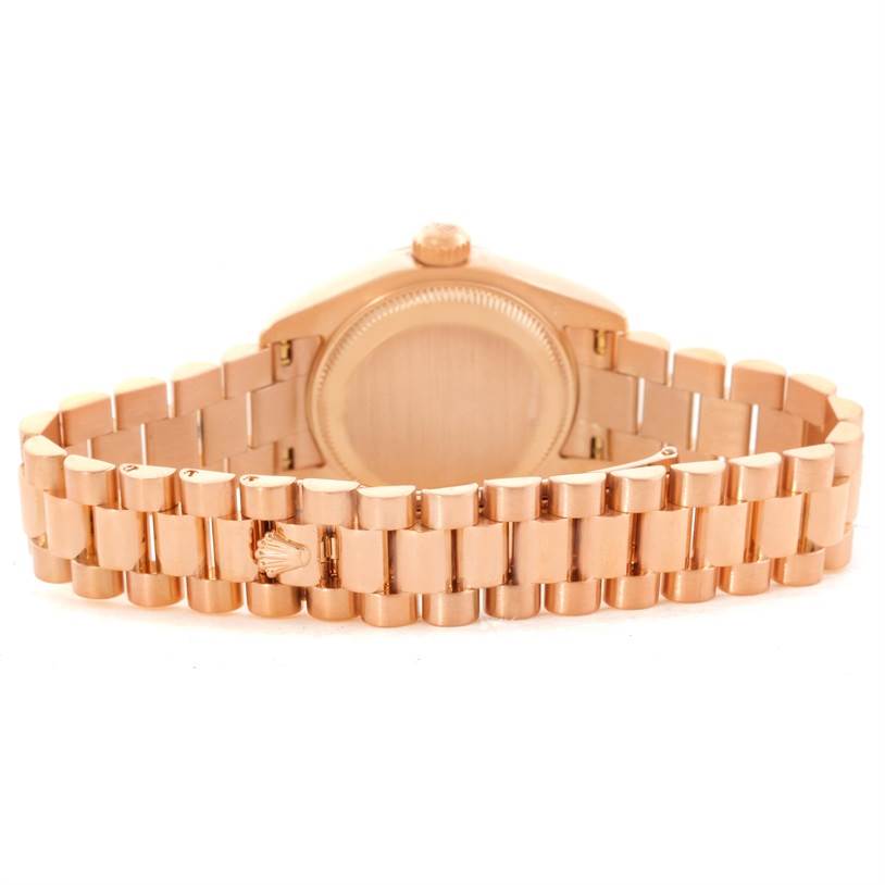 This image shows the back and bracelet of the Rolex President 179175 Women's Rose Gold Pink Dial 179175 Women's Rose Gold Pink Dial model watch.