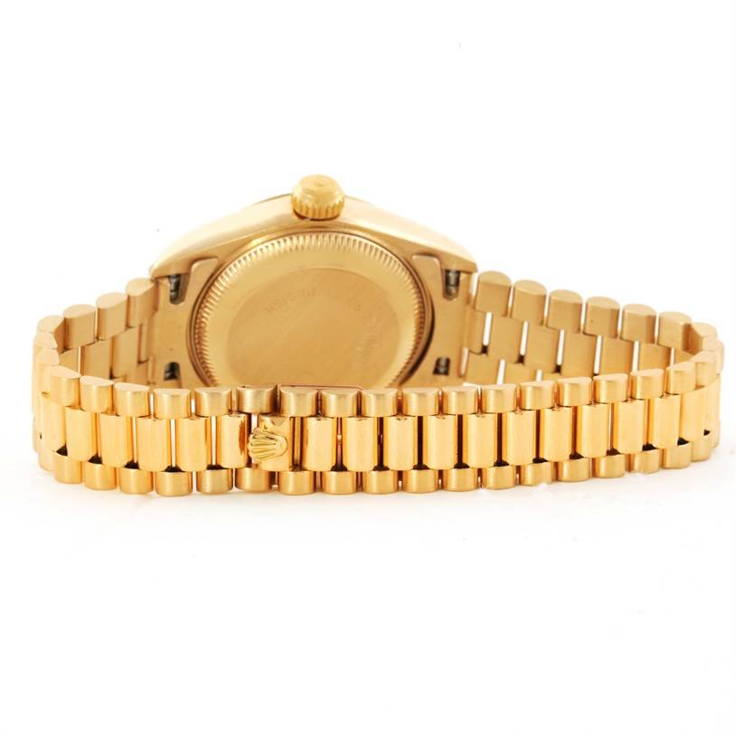 The image shows the back case and bracelet of a Rolex President 69178 Women's Yellow Gold Champagne Dial 69178 Women's Yellow Gold Champagne Dial model watch.