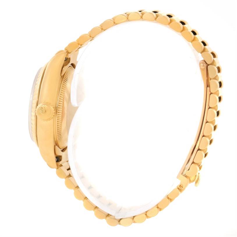 The image shows a side profile of a Rolex President 69178 Women's Yellow Gold Champagne Dial 69178 Women's Yellow Gold Champagne Dial model, highlighting its gold case and bracelet.