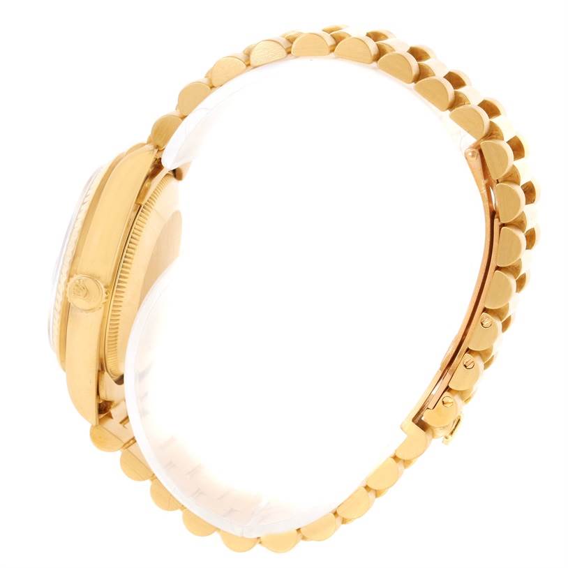 This image shows the side view of a Rolex President 68278 Men
s Yellow Gold Champagne Dial 68278 Men
s Yellow Gold Champagne Dial model watch, highlighting its gold case and bracelet.