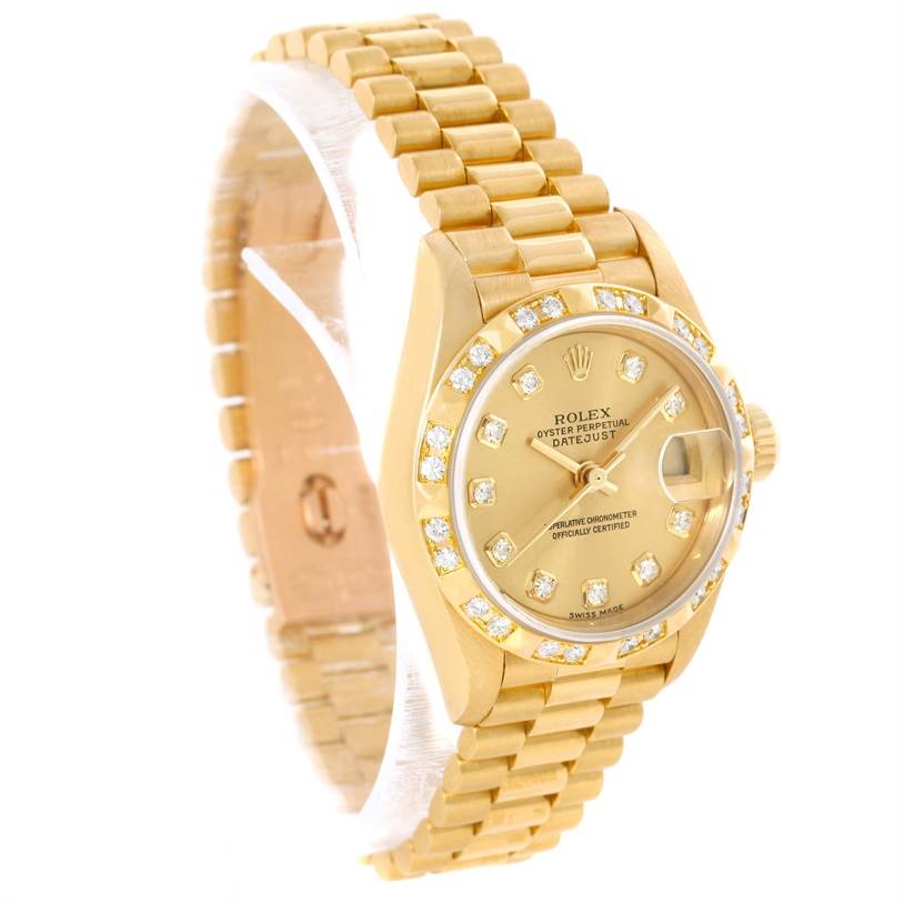 The image shows a gold Rolex President 79258 Women's Yellow Gold Champagne Dial 79258 Women's Yellow Gold Champagne Dial model watch with diamond markers, seen from an angled front view.