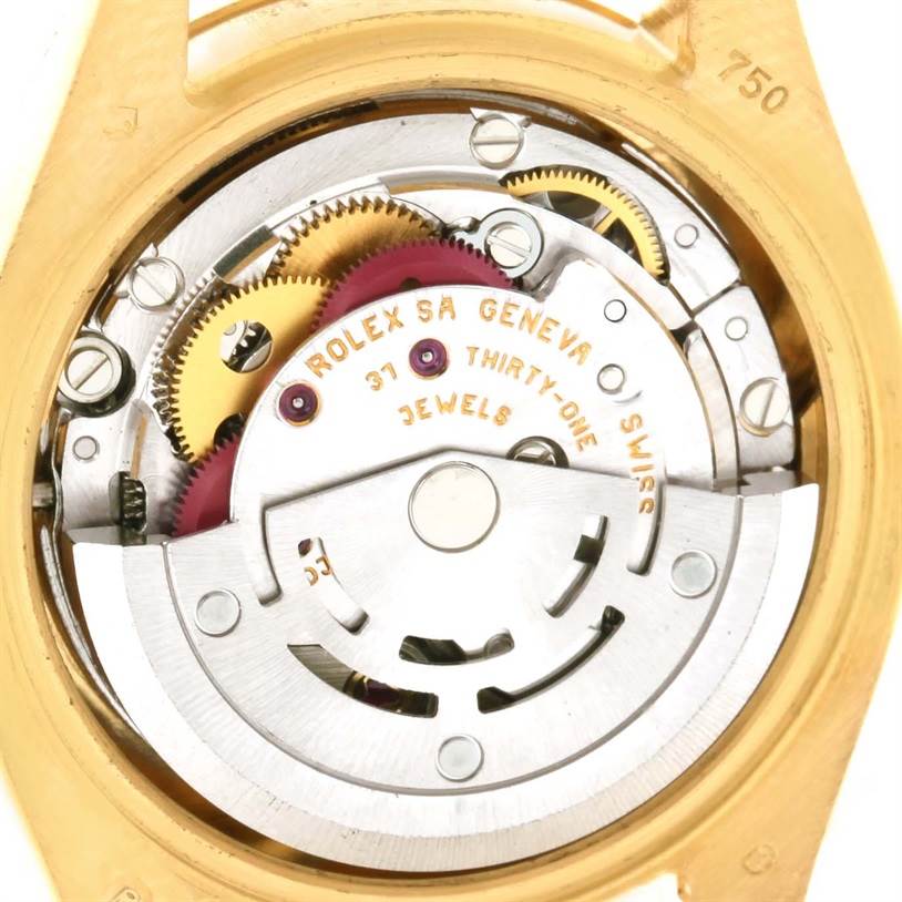 This image shows the internal mechanical movement of a Rolex President 179238 Women
s Yellow Gold Mother of Pearl Dial 179238 Women
s Yellow Gold Mother of Pearl Dial model watch, including gears and the rotor.