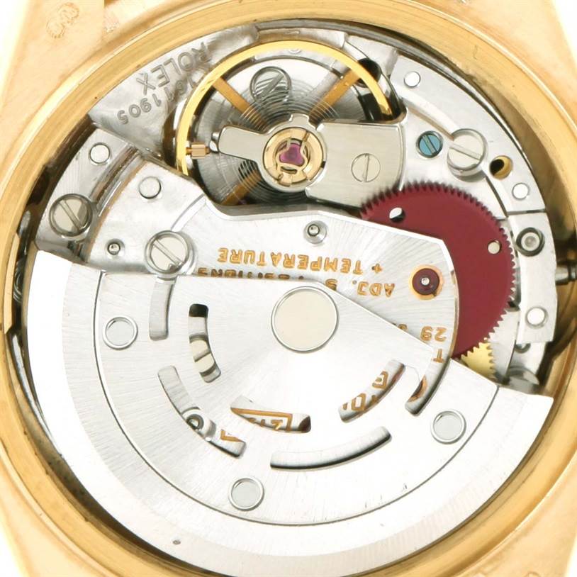 This image shows the internal movement mechanism of a Rolex President 69158 Women's Yellow Gold Black Dial 69158 Women's Yellow Gold Black Dial model watch at a close-up angle.
