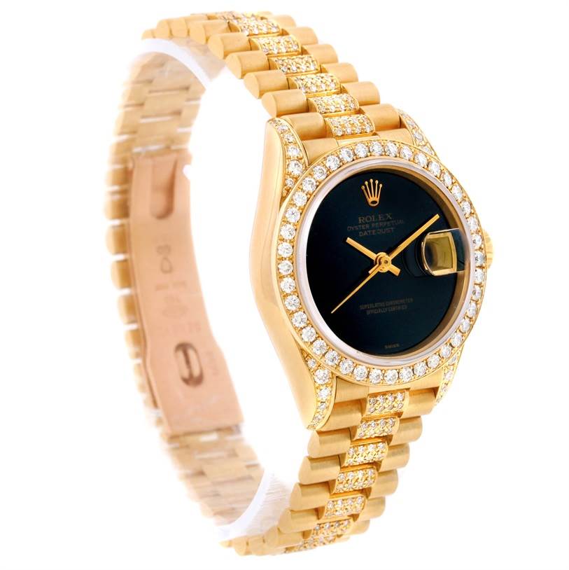 This Rolex President 69158 Women's Yellow Gold Black Dial 69158 Women's Yellow Gold Black Dial model watch is shown at an angle, highlighting the diamond-studded bezel, black dial, and gold bracelet.