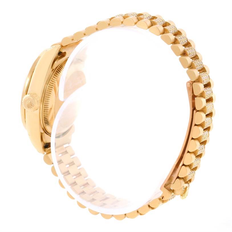 The image shows a side view of the Rolex President 69158 Women's Yellow Gold Black Dial 69158 Women's Yellow Gold Black Dial model wristwatch, highlighting the crown and bracelet.