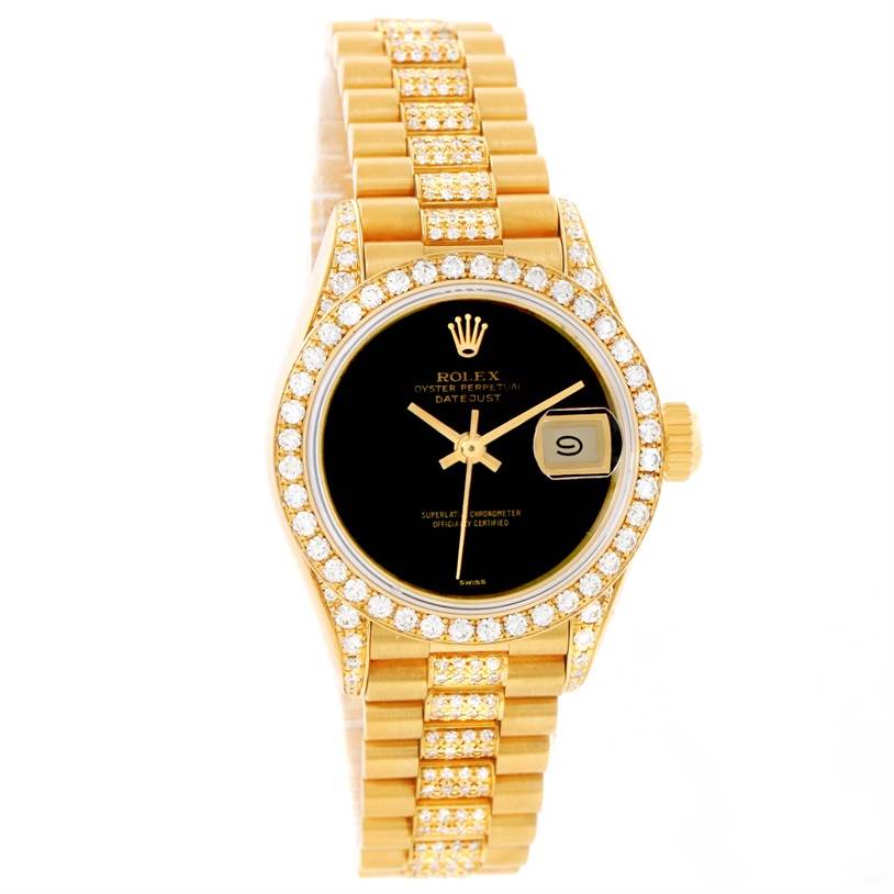 The image shows a Rolex President 69158 Women's Yellow Gold Black Dial 69158 Women's Yellow Gold Black Dial model watch from an overhead angle, featuring a diamond-encrusted bezel, gold bracelet, and black dial.