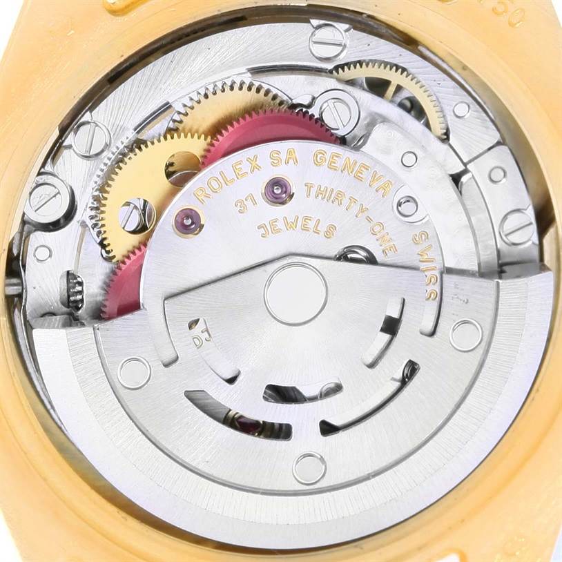 The image shows the internal mechanism or movement of a Rolex President 179178 Women's Yellow Gold Champagne Dial 179178 Women's Yellow Gold Champagne Dial model watch, including gears and jewel bearings.