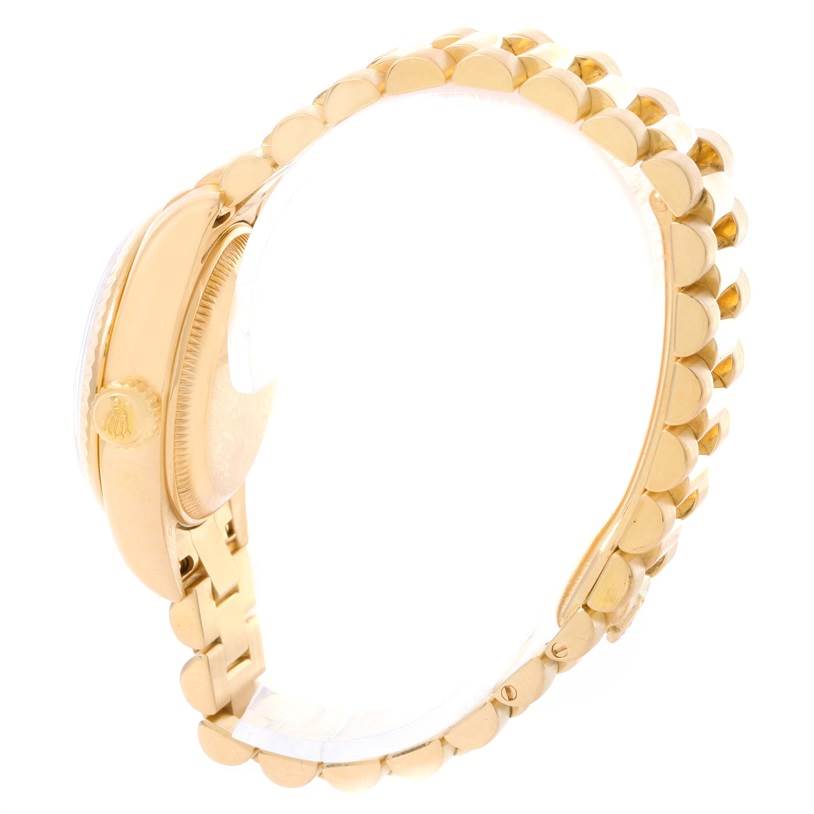 This image shows a side view of the Rolex President 179178 Women's Yellow Gold Champagne Dial 179178 Women's Yellow Gold Champagne Dial model watch, highlighting its gold case and iconic gold bracelet.