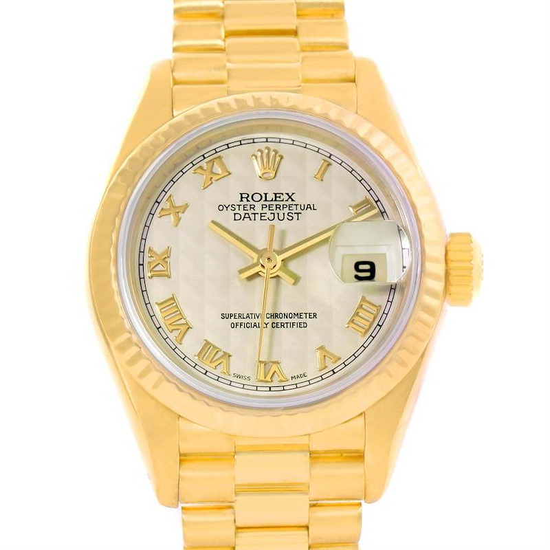 The image shows a frontal view of the Rolex President model watch, highlighting its gold case, dial, and band.