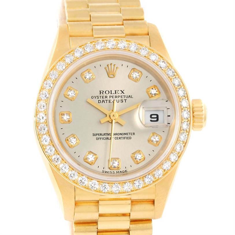 This image shows a close-up of the dial, bezel, and bracelet of a Rolex President 79138 Women's Yellow Gold Silver Dial 79138 Women's Yellow Gold Silver Dial Datejust watch.