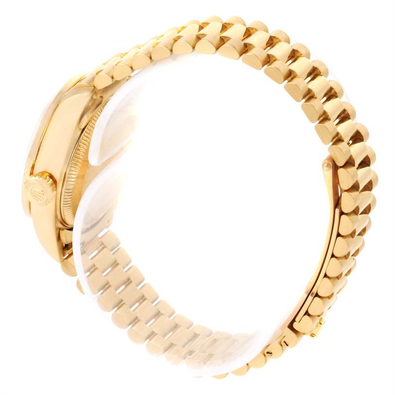 The image showcases a side view of the Rolex President 79138 Women's Yellow Gold Silver Dial 79138 Women's Yellow Gold Silver Dial model watch, highlighting the gold bracelet and case.