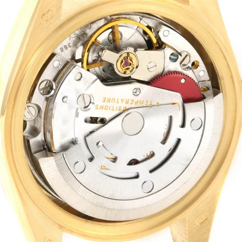 This is a close-up view of the internal mechanism of a Rolex President 69178 Women's Yellow Gold Blue Dial 69178 Women's Yellow Gold Blue Dial model watch.