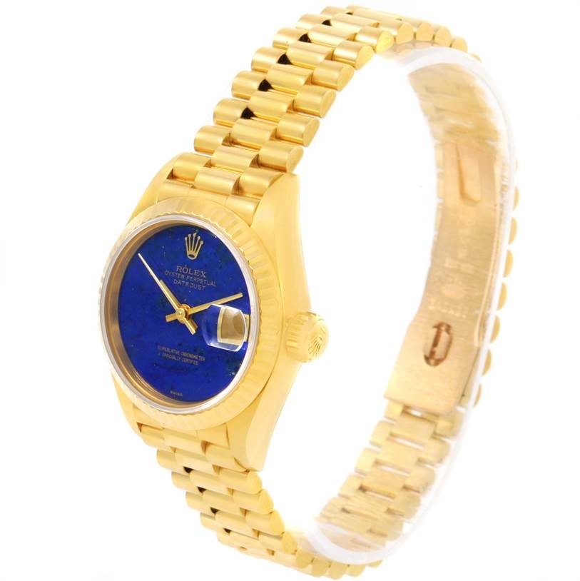 This image shows a side-angle view of a Rolex President 69178 Women's Yellow Gold Blue Dial 69178 Women's Yellow Gold Blue Dial model watch, highlighting the dial, crown, and bracelet.