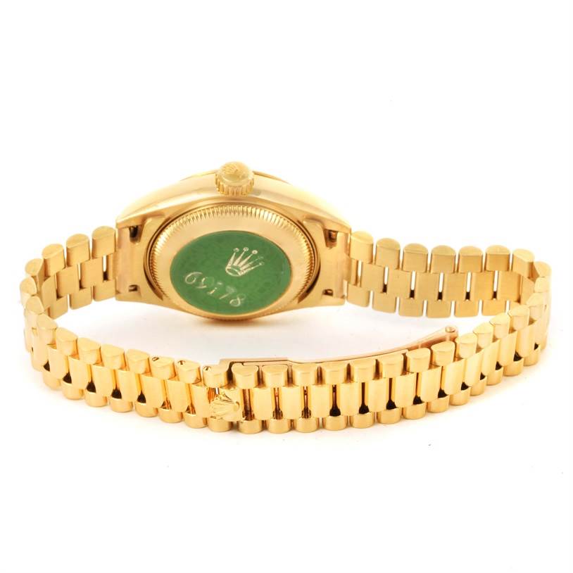 The image shows the back view and the bracelet of a Rolex President 69178 Women's Yellow Gold Blue Dial 69178 Women's Yellow Gold Blue Dial model watch.