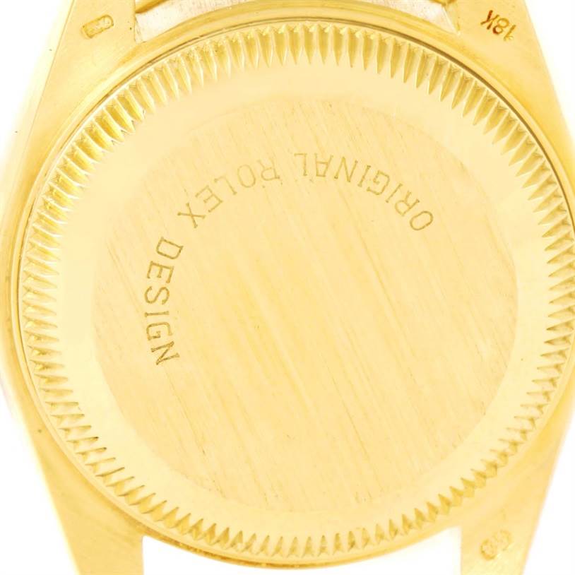 The image shows the case back of a Rolex President 69278 Women's Yellow Gold Brown Dial 69278 Women's Yellow Gold Brown Dial model watch, inscribed with "ORIGINAL ROLEX DESIGN."