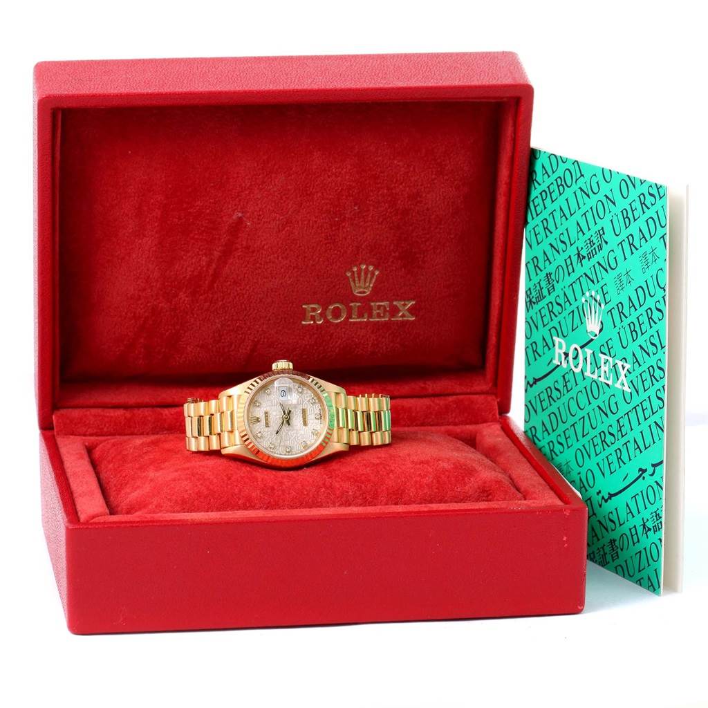 The Rolex President 69178 Women's Yellow Gold Beige Dial 69178 Women's Yellow Gold Beige Dial watch is shown from a front angle, in its red box with accompanying documentation on the right.