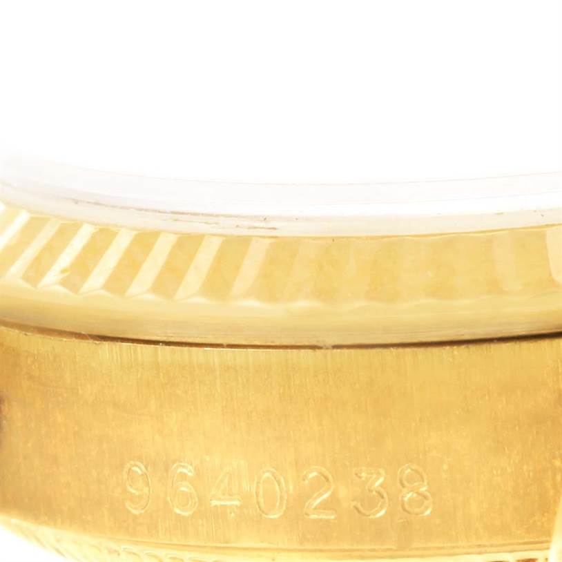 The image shows a close-up of the serial number and bezel on the Rolex President 68278 Women's Yellow Gold Champagne Dial 68278 Women's Yellow Gold Champagne Dial model watch.