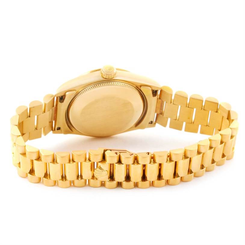 This image shows the back case and bracelet of the Rolex President 68278 Women's Yellow Gold Champagne Dial 68278 Women's Yellow Gold Champagne Dial model watch.