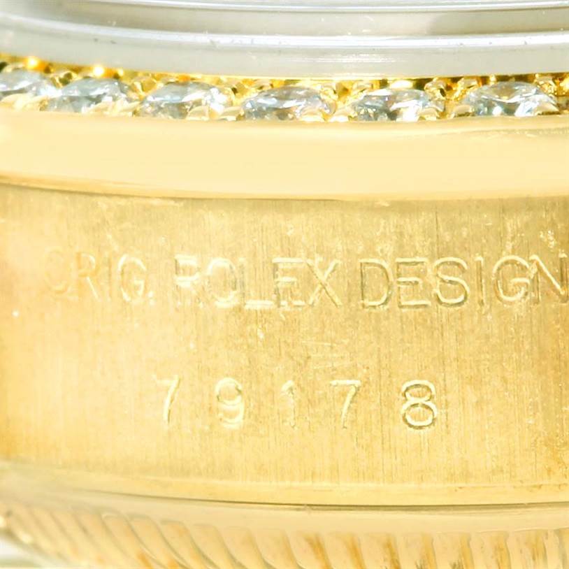 This close-up image shows the engraved side and diamond bezel of a President model by Rolex.