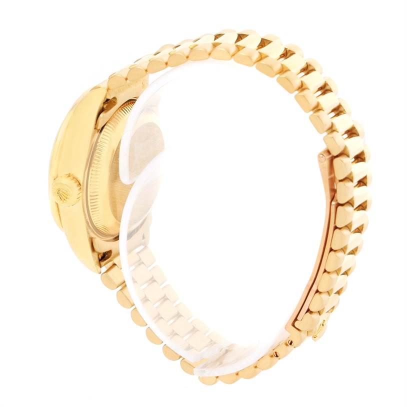 This image shows a side view of the Rolex President 79178 Women's Yellow Gold Silver Dial 79178 Women's Yellow Gold Silver Dial model watch, highlighting the crown, case, and bracelet.