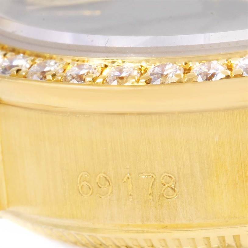 The image shows a close-up of the bezel and case side of a Rolex President 69178 Women's Yellow Gold Black Dial 69178 Women's Yellow Gold Black Dial watch with diamond accents and the model number 69178.
