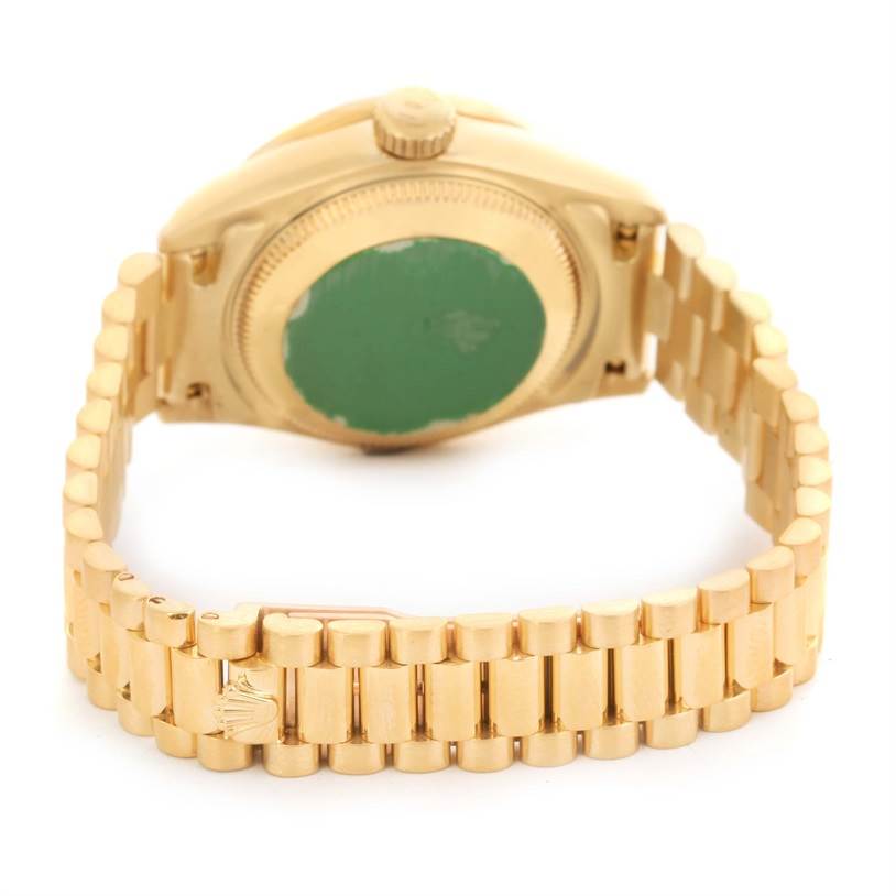The image shows the back and bracelet of the Rolex President 69138 Women's Yellow Gold Blue Dial 69138 Women's Yellow Gold Blue Dial model watch from a rear angle.