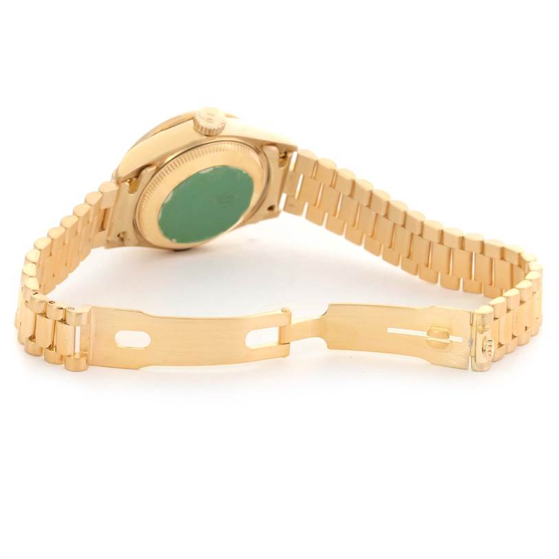 The Rolex President 69138 Women's Yellow Gold Blue Dial 69138 Women's Yellow Gold Blue Dial model watch is shown from the back, highlighting its bracelet and clasp.