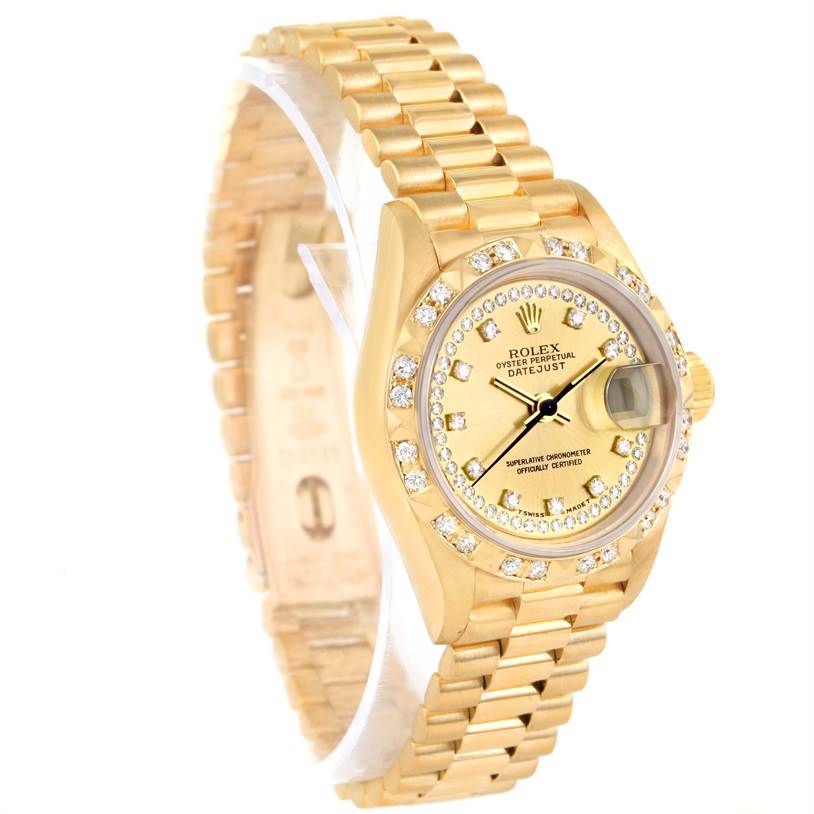 The image shows a Rolex President 69258 Women
s Champagne Dial 69258 Women
s Champagne Dial model watch at a slight angle, highlighting its gold bracelet and diamond-embellished bezel and dial.