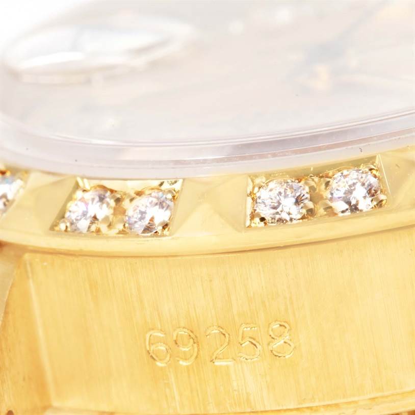 The image shows a close-up angled view of the bezel, dial edge, and engraved model number of the Rolex President 69258 Women
s Champagne Dial 69258 Women
s Champagne Dial watch.