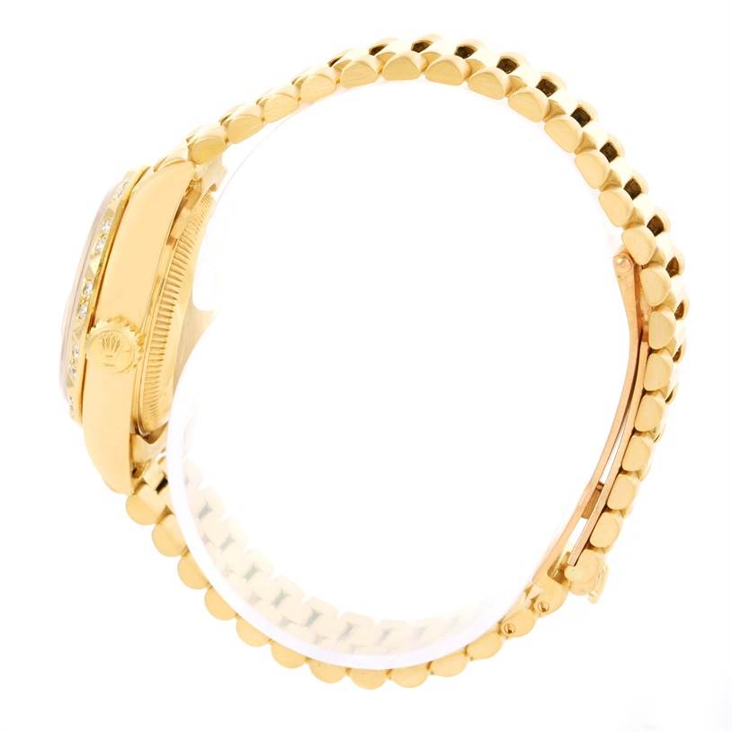 The image shows a side view of a Rolex President 69258 Women
s Champagne Dial 69258 Women
s Champagne Dial model watch, highlighting its crown and band in gold.