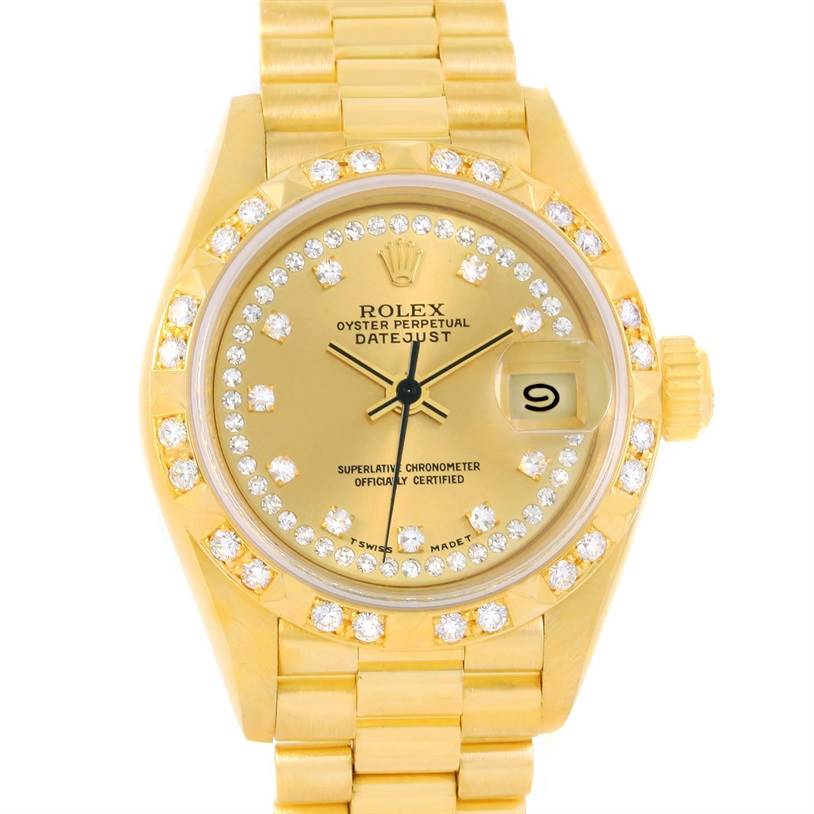 The image shows a front view of a Rolex President 69258 Women
s Champagne Dial 69258 Women
s Champagne Dial model with a gold bracelet and a diamond-encrusted bezel and dial.