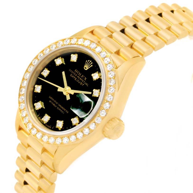 The image shows a Rolex President 69178 Women's Yellow Gold Black Dial 69178 Women's Yellow Gold Black Dial model watch from an angled side view, highlighting the diamond bezel, black dial, and gold link bracelet.