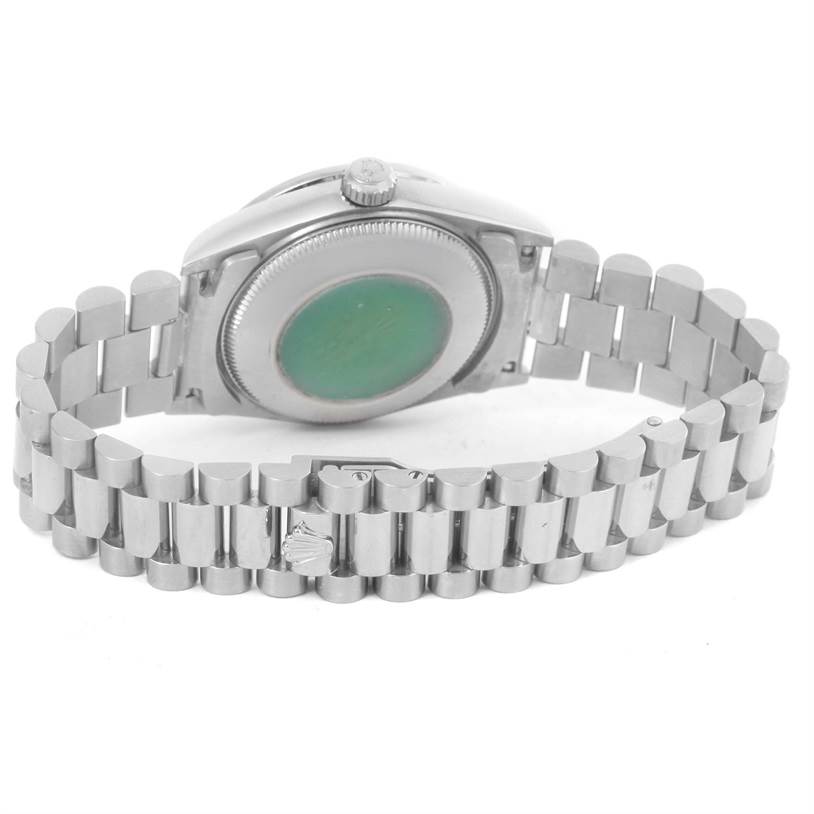 The image shows the back view of the Rolex President 68159 Women's White Gold Mother of Pearl Dial 68159 Women's White Gold Mother of Pearl Dial model, highlighting the case back, crown, and bracelet.