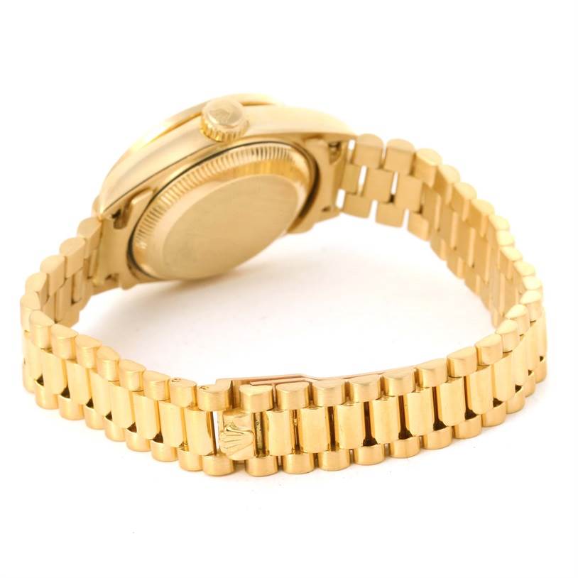 The image shows the back and side view of a Rolex President 69178 Women's Yellow Gold Champagne Dial 69178 Women's Yellow Gold Champagne Dial model watch, focusing on the bracelet and clasp.