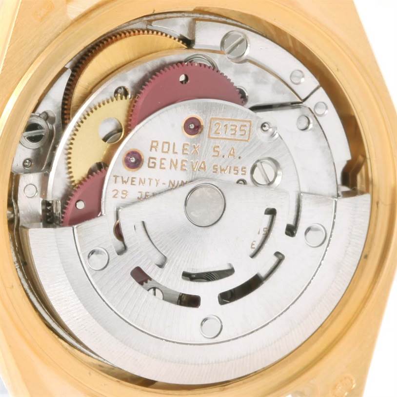 This image shows a close-up of the movement mechanism of a Rolex President 69188 Women's Yellow Gold Champagne Dial 69188 Women's Yellow Gold Champagne Dial model watch.
