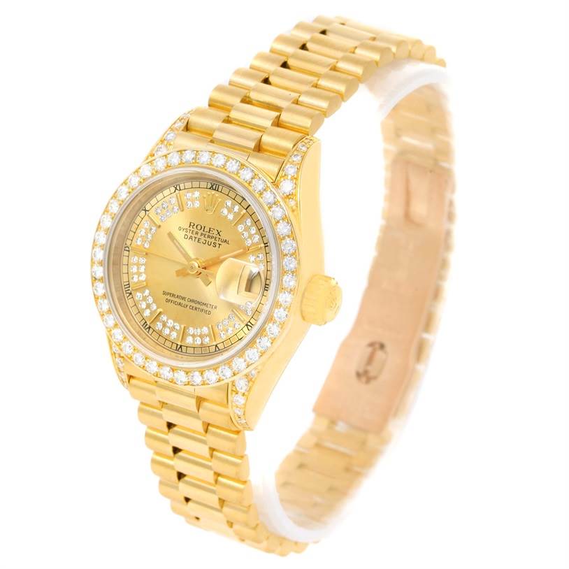 This image shows a Rolex President 69188 Women's Yellow Gold Champagne Dial 69188 Women's Yellow Gold Champagne Dial model watch viewed from a front angle, highlighting its gold bracelet, diamond-studded bezel, and dial.