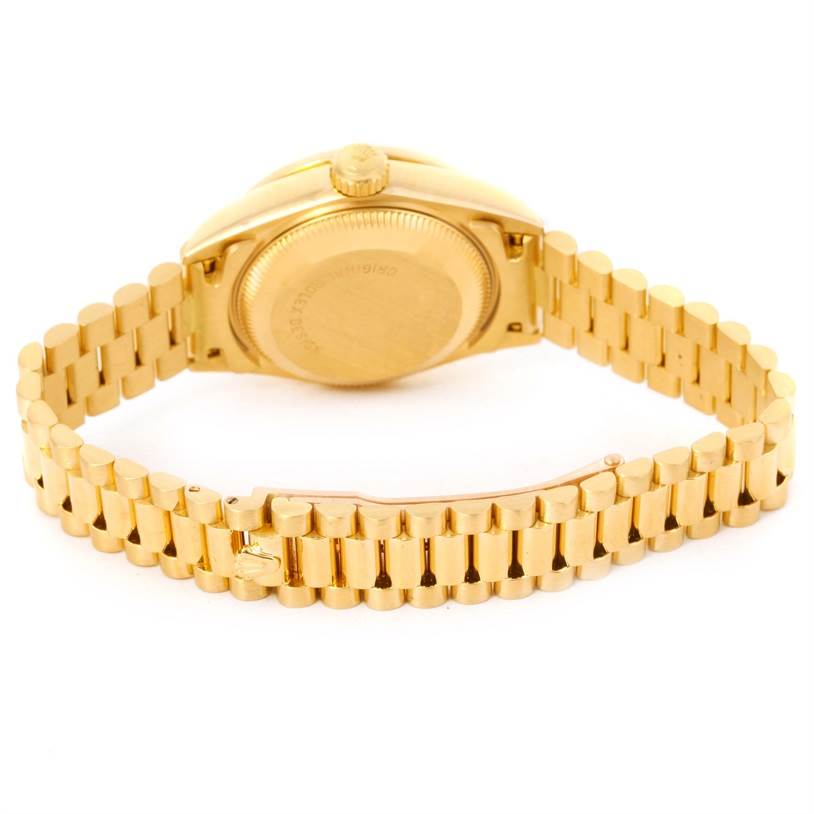 This image shows the back case and bracelet of a Rolex President 69188 Women's Yellow Gold Champagne Dial 69188 Women's Yellow Gold Champagne Dial model watch, with the crown and clasp visible.