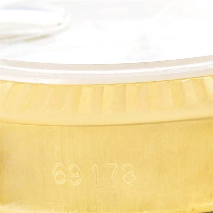 The image shows a close-up of the case and fluted bezel of a Rolex President 69178 Women's Yellow Gold White Dial 69178 Women's Yellow Gold White Dial model watch, highlighting the model number 69178.