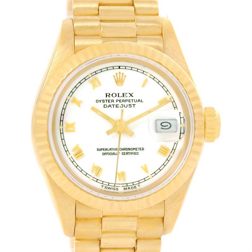 The image shows a Rolex President 69178 Women's Yellow Gold White Dial 69178 Women's Yellow Gold White Dial model watch from a front angle, displaying the dial, fluted bezel, and part of the bracelet.
