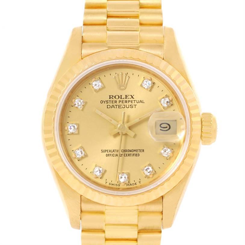 The image shows the front view of the Rolex President 69178 Women
s Yellow Gold Champagne Dial 69178 Women
s Yellow Gold Champagne Dial Datejust watch, focusing on its gold dial, bezel, and part of the bracelet.