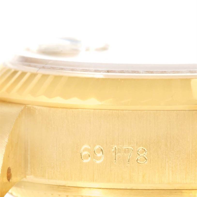 The image shows a close-up of the case side and bezel of a Rolex President 69178 Women
s Yellow Gold Champagne Dial 69178 Women
s Yellow Gold Champagne Dial model, highlighting its model number 69178.