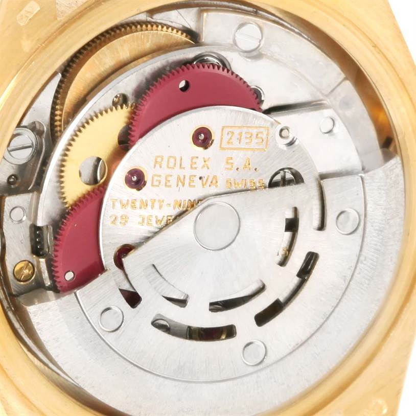 This image shows the intricate internal movement mechanism of a Rolex President 69178 Women
s Yellow Gold Champagne Dial 69178 Women
s Yellow Gold Champagne Dial model watch.